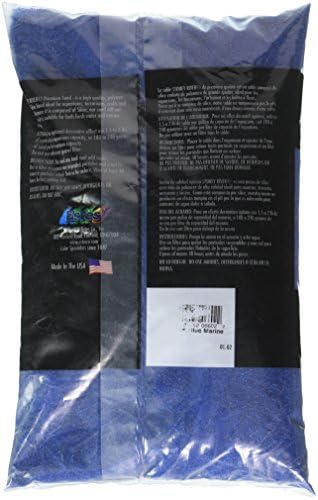 Blue aquarium sand substrate inside a glass fish tank