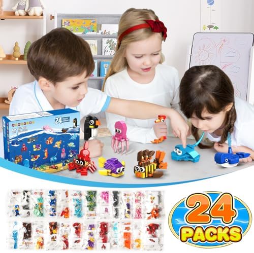 Assembled mini shark seahorse and dolphin models from the HOGOKIDS classroom prizes collection.