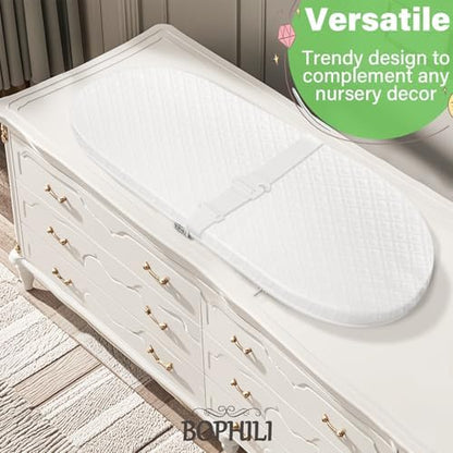 Bophili mattress placed inside a moses basket for display.