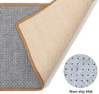 Cat scratch mat installed on hardwood living room floor protecting home carpet