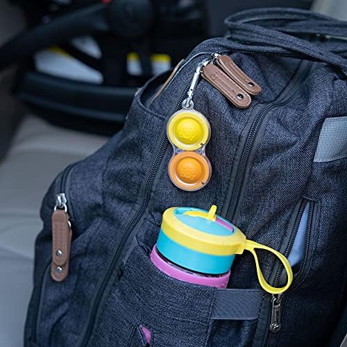 Authentic USA imported clear fidget toy pack attached to a backpack using the included mini carabiner clips.