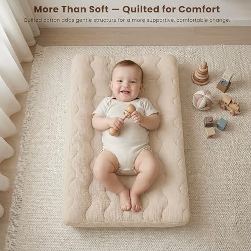 Konssy boho nursery bedding set fitted securely on a standard diaper changing table mattress.