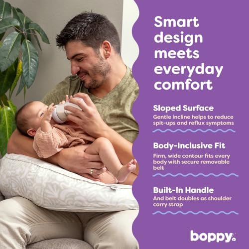 Parent using Boppy Uplift nursing pillow with adjustable belt