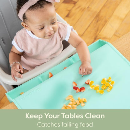 UpwardBaby food catching baby mat showing the built in suction base and three pockets.