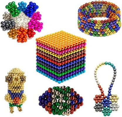Adult hands building with magnetic desk fidget balls