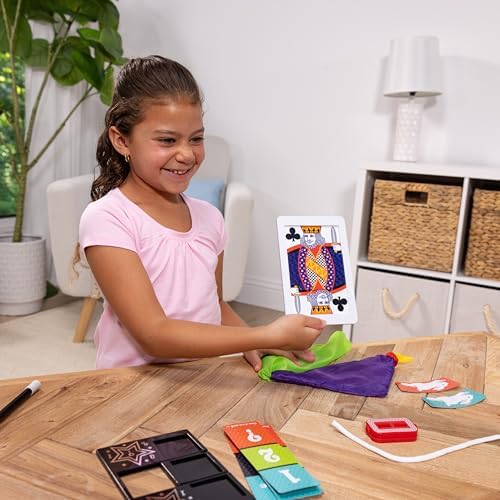 Melissa & Doug 10 piece children beginner magic tricks set components spread out