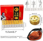 Close up of cylindrical golden yellow moxa rolls wrapped in white paper