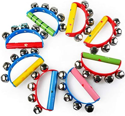 Vivid color wooden jingle stick shaker rattles held by a child showing the smooth sensory handle design