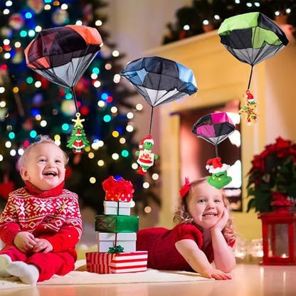 Rdogeia holiday character figures with their attached green and white parachutes.