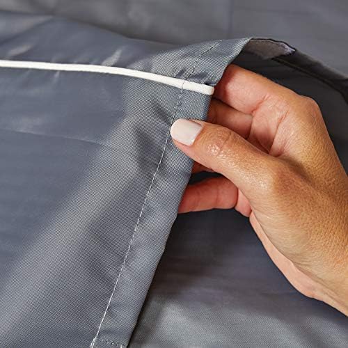 Durable hook and loop fasteners holding the gray pet crate cover securely