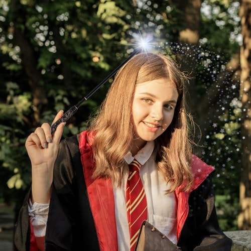 Kid holding ChampWe light up wizard wand for cosplay