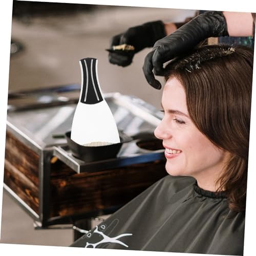Black handle hair coloring paddle for even bleach distribution