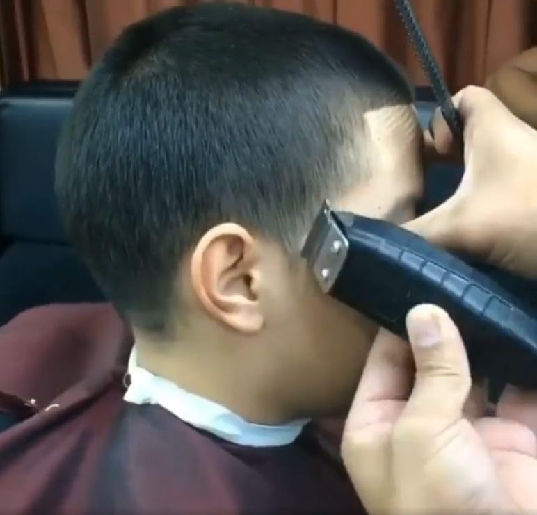 Black Andis GTX T-Outliner professional grooming tool side profile