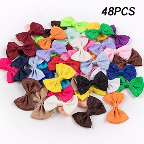 Xima bows displayed for cat and kitten styling