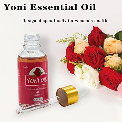 Hand applying rose yoni oil for moisturizing and skin elasticity.
