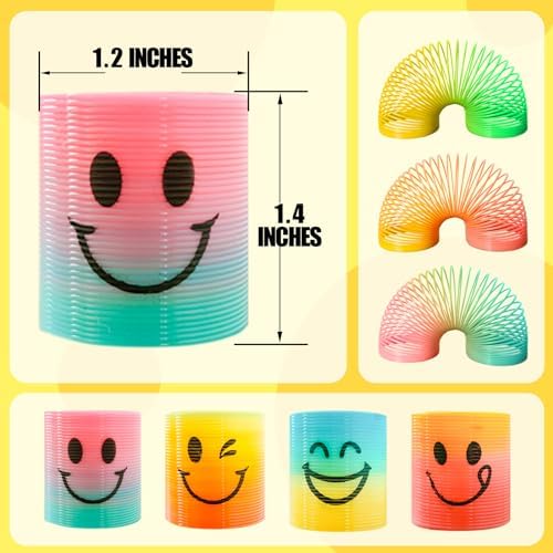 Close up view of the four distinct cheerful smiling face designs on the mini rainbow spring toys.
