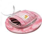 Bottom view of pet hat showing chin strap mechanism