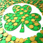Miniature lucky clover plastic festive coins in gold and green colors
