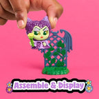 Unboxed Disney Doorables In Full Bloom characters with glittery eyes and snap together accessories.