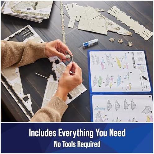 Star Wars Millennium Falcon 3D puzzle kit being assembled with detailed instructions.