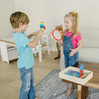 Side view of the Melissa & Doug musical toy set showing product dimensions.