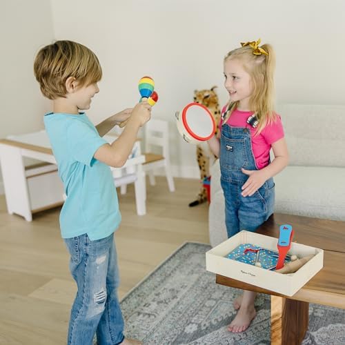 Side view of the Melissa & Doug musical toy set showing product dimensions.