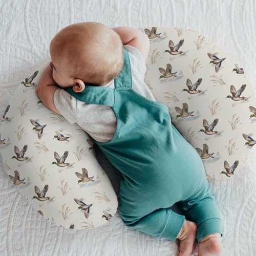 Close up of vintage duck hunting pattern on nursing pillow slipcover