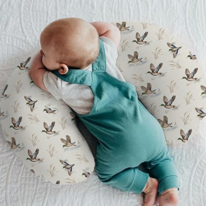 Close up of vintage duck hunting pattern on nursing pillow slipcover