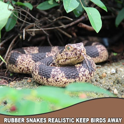Upitry realistic garden plastic snake deterrent placed on a tree branch