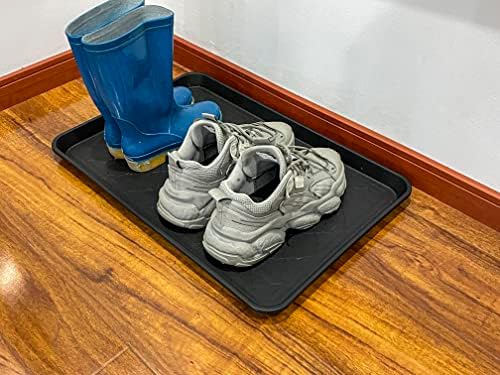 PetLike waterproof mat holding muddy boots indoors