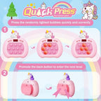Pink unicorn fast push bubble game toy being held by a child for stress relief