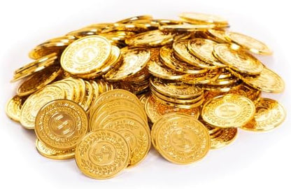 Assorted gold play coins piled up inside a small treasure chest prop