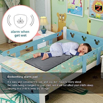 Two large quilted washable urine pads laid out flat on a child bed.