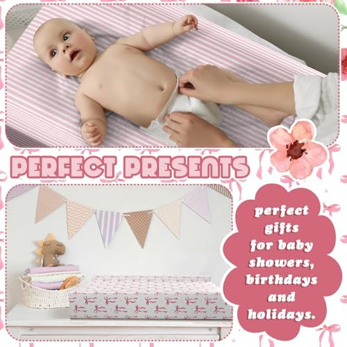 Peryiter baby girl changing pad cover installed securely on a standard nursery table.