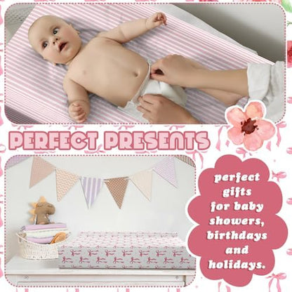 Peryiter baby girl changing pad cover installed securely on a standard nursery table.