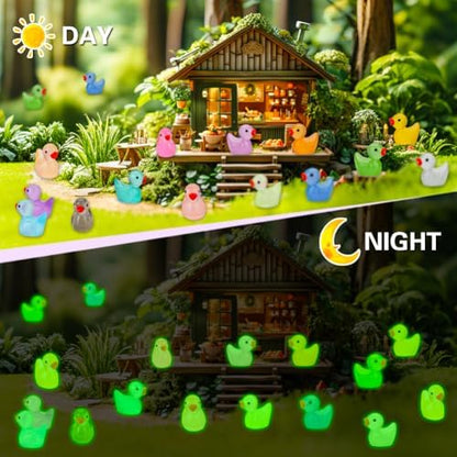 JYXT small resin ducks placed within a miniature outdoor fairy garden landscape.