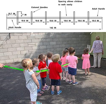 Preschool children using Wanateber safety walking rope outdoors