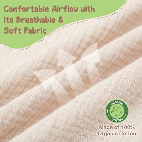 Mother using Infancie muslin nursing cover for breastfeeding