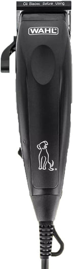 Wahl pet grooming kit accessories including blade oil and cleaning brush.
