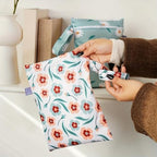 Compact travel organizer pouch placed inside a tote bag