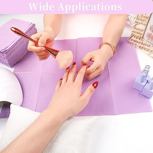 Stack of 125 purple nail art napkins for salon use