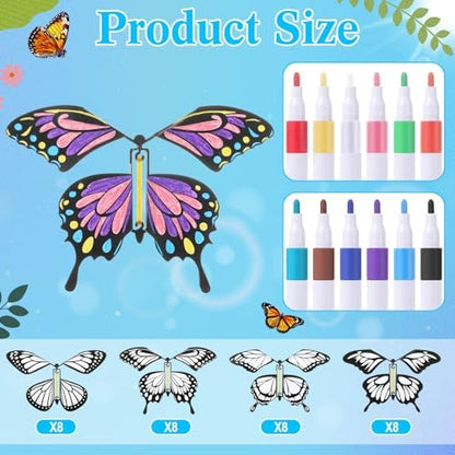 Thirty-two white wind-up butterflies and twelve colored pens displayed for kids party activity