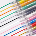 Hand holding Xiahium nail polish pen demonstrating precision line work