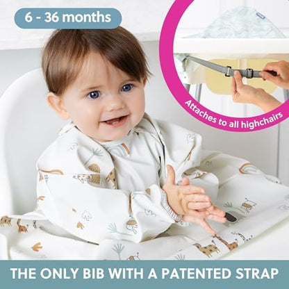 BIBaDO coverall feeding bib attached to a highchair tray demonstrating gap free mealtime protection