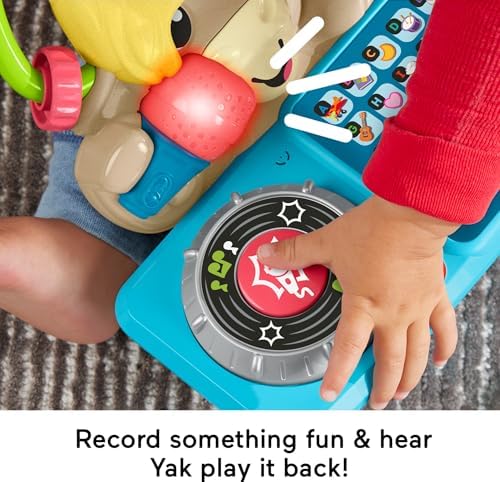 Toddler exploring the spinning turntable and fine motor clacker bead bar on the musical animal toy.