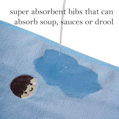 Toddler wearing waterproof Raxifu bib for mealtime protection