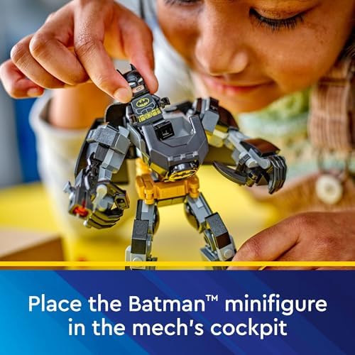 Side profile of the assembled 140 piece Batman collectible action figure demonstrating the articulated leg and arm joints