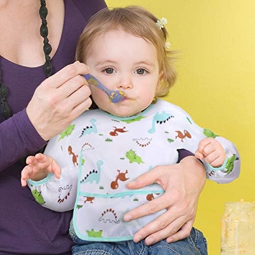 Close-up of the flipped out crumb catcher pocket on baby bib smock