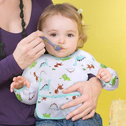 Close-up of the flipped out crumb catcher pocket on baby bib smock