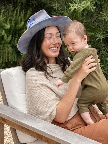 We Are Amma nursing poncho styled as a fashionable scarf